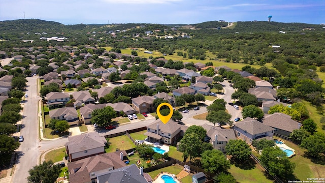 24719 Alamosa Fls, San Antonio, TX 78255 - aerial perspective of suburban area with a pool