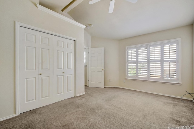 67 Oakwell Farms, San Antonio, TX 78218 - unfurnished bedroom with carpet floors, a closet, vaulted ceiling, a ceiling fan, and baseboards