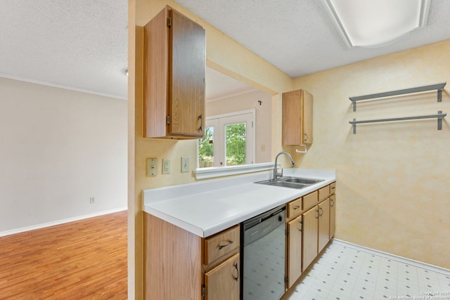 6826 Evercrest, San Antonio, TX 78239 - kitchen with dishwashing machine, a sink, light countertops, and light flooring