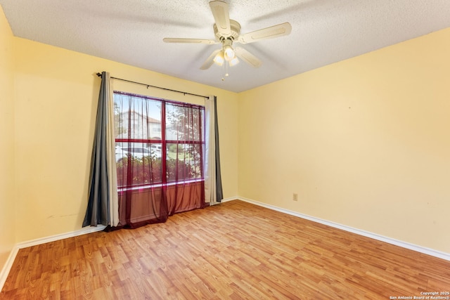 6826 Evercrest, San Antonio, TX 78239 - empty room featuring light wood-style floors, a ceiling fan, a textured ceiling, and baseboards