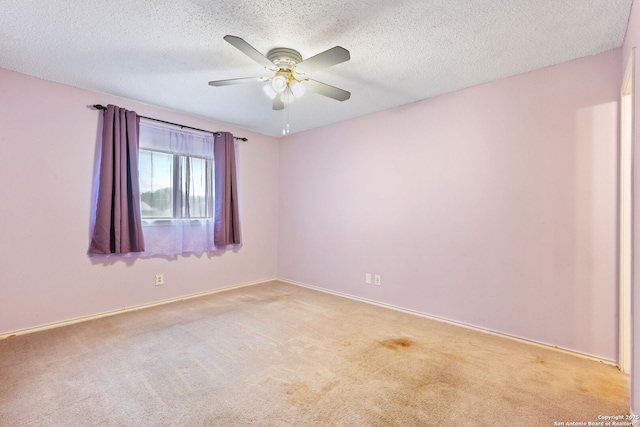 6826 Evercrest, San Antonio, TX 78239 - empty room with light carpet, ceiling fan, a textured ceiling, and baseboards