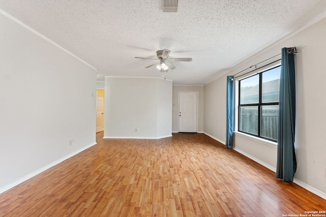 6826 Evercrest, San Antonio, TX 78239 - unfurnished room with a ceiling fan, light wood-type flooring, a textured ceiling, baseboards, and crown molding