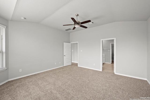 12942 Irvin Path, San Antonio, TX 78254 - unfurnished bedroom with lofted ceiling, light carpet, baseboards, connected bathroom, and ceiling fan