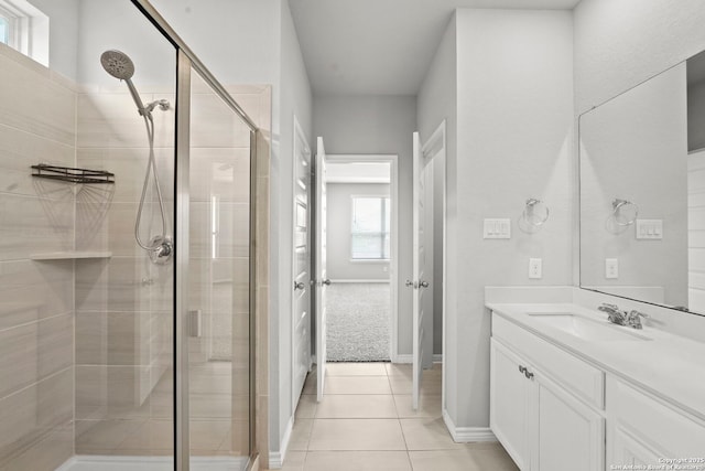 12942 Irvin Path, San Antonio, TX 78254 - full bath with a stall shower, vanity, tile patterned flooring, and baseboards