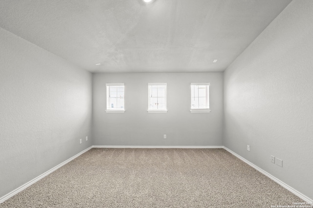 12942 Irvin Path, San Antonio, TX 78254 - unfurnished room featuring plenty of natural light, carpet flooring, and baseboards