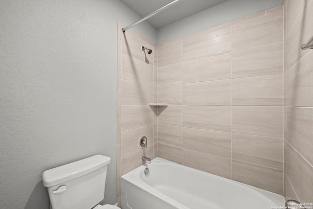12942 Irvin Path, San Antonio, TX 78254 - full bathroom featuring toilet, a textured wall, and washtub / shower combination