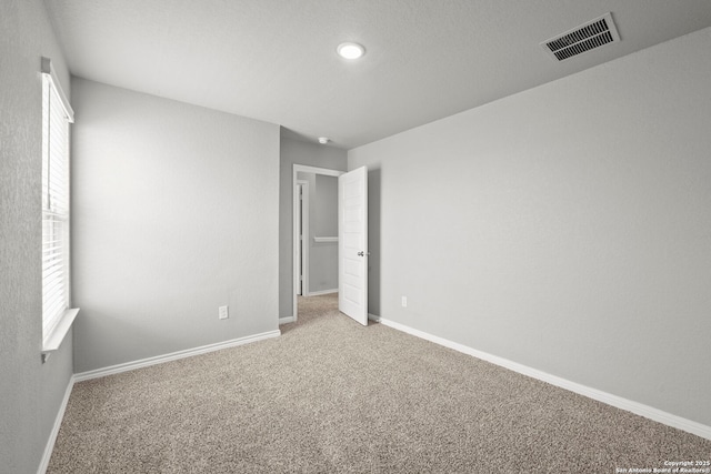 12942 Irvin Path, San Antonio, TX 78254 - unfurnished bedroom featuring carpet, baseboards, and recessed lighting