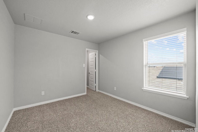 12942 Irvin Path, San Antonio, TX 78254 - carpeted spare room featuring baseboards and recessed lighting