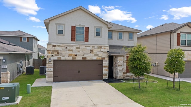 12942 Irvin Path, San Antonio, TX 78254 - view of front of property featuring stone siding, an attached garage, cooling unit, and a front yard