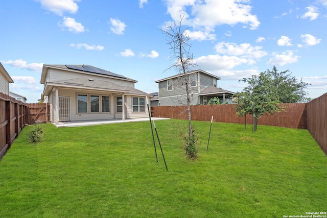 12942 Irvin Path, San Antonio, TX 78254 - rear view of property featuring solar panels and a patio