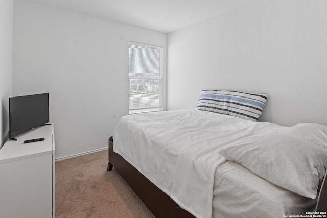 4284 Thalweg Way, San Antonio, TX 78223 - bedroom featuring carpet flooring and baseboards