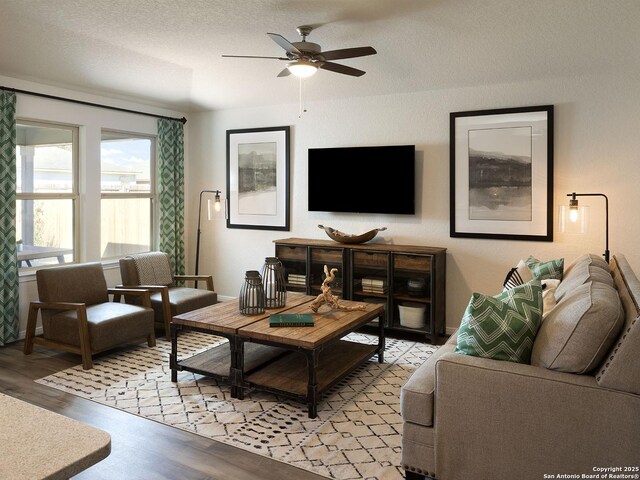 204 Dakota Rdg, Cibolo, TX 78108 - living area featuring ceiling fan and light wood-type flooring