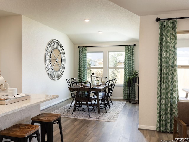 204 Dakota Rdg, Cibolo, TX 78108 - dining area with dark wood-style floors and baseboards