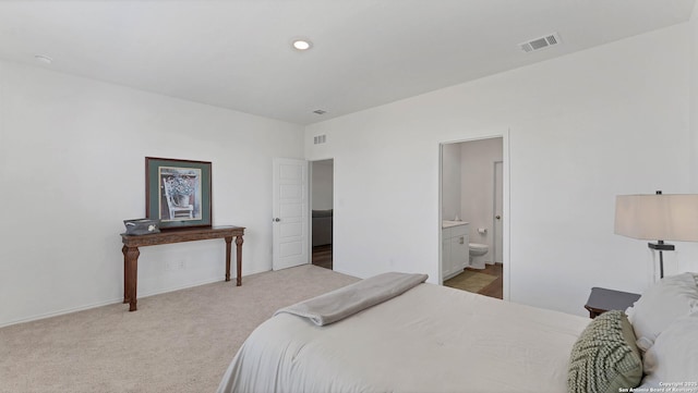 729 Heartseed Ave, New Braunfels, TX 78130 - bedroom featuring carpet floors, ensuite bath, recessed lighting, and baseboards