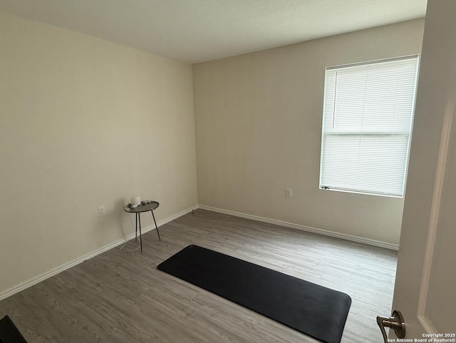 4543 Zoe Pass, San Antonio, TX 78222 - unfurnished room with wood finished floors and baseboards