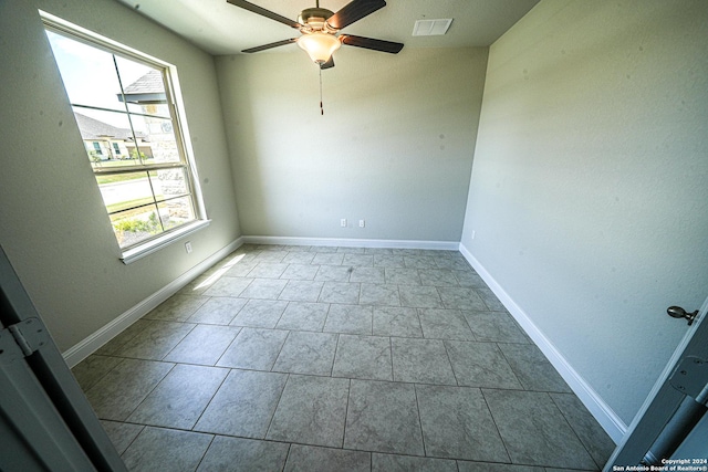 5721 Provo Pl, San Antonio, TX 78263 - unfurnished room featuring ceiling fan, baseboards, and tile patterned floors