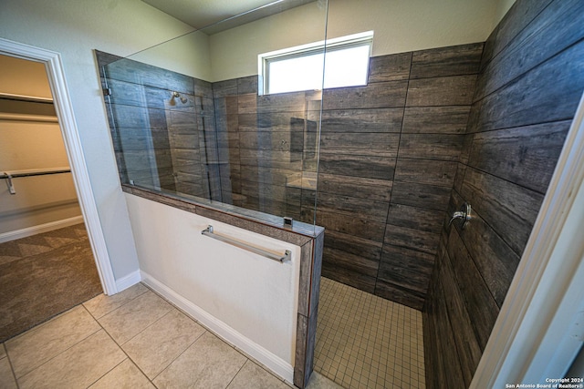 5721 Provo Pl, San Antonio, TX 78263 - full bathroom with a walk in shower, a walk in closet, and tile patterned flooring