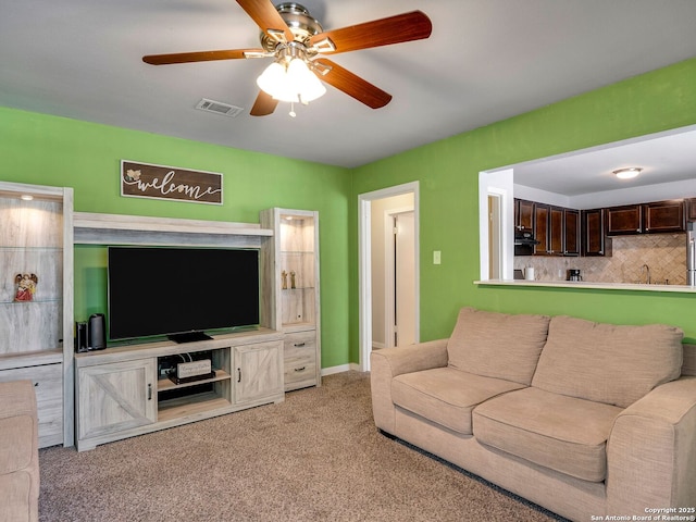 126 Arnold, San Antonio, TX 78213 - living area featuring ceiling fan and light carpet
