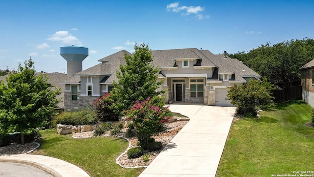24342 Mateo Rdg, San Antonio, TX 78261 - prairie-style home featuring a shingled roof, stone siding, a front lawn, stucco siding, and driveway