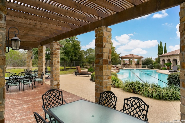 24342 Mateo Rdg, San Antonio, TX 78261 - view of patio / terrace with outdoor dining area, a gazebo, a community pool, and a pergola