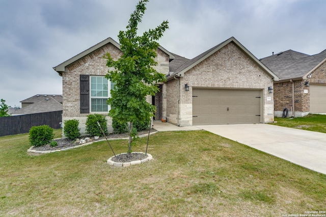 7604 Pecos Rdg, Boerne, TX 78015 - view of front facade featuring an attached garage, concrete driveway, and brick siding