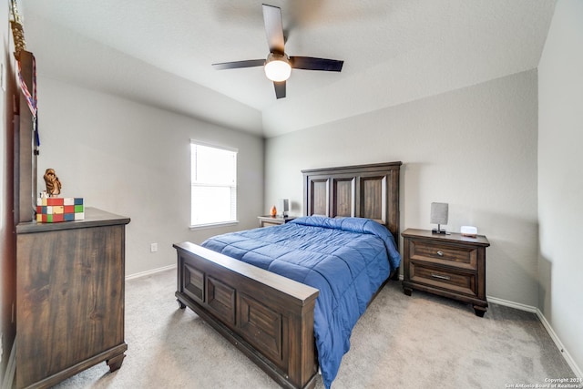 7604 Pecos Rdg, Boerne, TX 78015 - bedroom with light carpet, baseboards, ceiling fan, and lofted ceiling