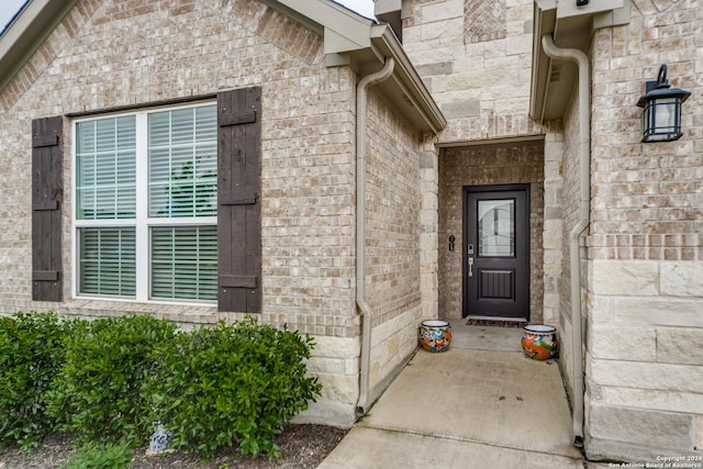 7604 Pecos Rdg, Boerne, TX 78015 - property entrance featuring brick siding