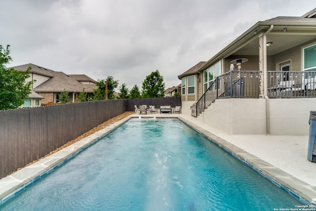 7604 Pecos Rdg, Boerne, TX 78015 - view of pool with an outdoor hangout area, a fenced backyard, and a patio area