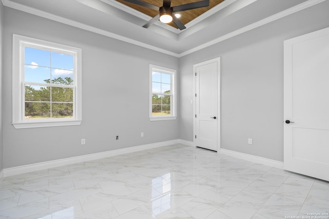 3828 Palomino Spgs, Bandera, TX 78003 - spare room with light marble finish flooring, ceiling fan, baseboards, crown molding, and a tray ceiling
