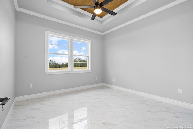 3828 Palomino Spgs, Bandera, TX 78003 - empty room with crown molding, a tray ceiling, light marble finish flooring, a ceiling fan, and baseboards