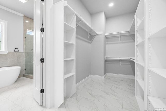 3828 Palomino Spgs, Bandera, TX 78003 - walk in closet with marble finish floors