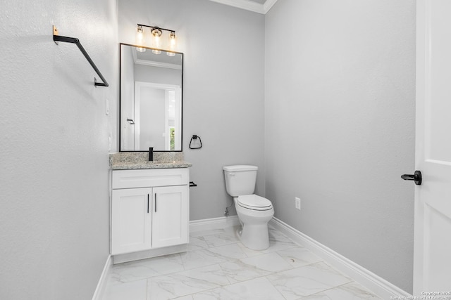 3828 Palomino Spgs, Bandera, TX 78003 - bathroom featuring marble look tile flooring, vanity, toilet, baseboards, and ornamental molding