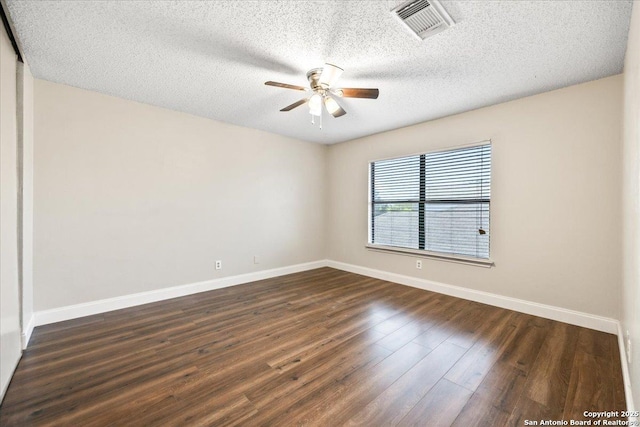 6119 Ferrysage, San Antonio, TX 78244 - empty room featuring a ceiling fan, baseboards, dark wood-type flooring, and a textured ceiling