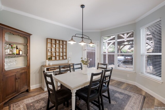 830 Emerald Bay, San Antonio, TX 78260 - dining area with dark wood-style flooring, ornamental molding, and baseboards