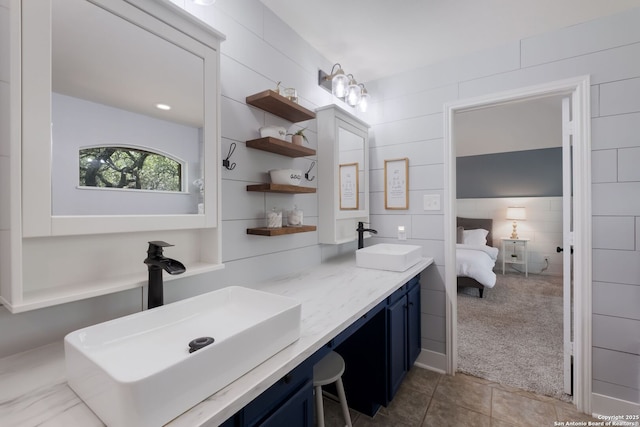 830 Emerald Bay, San Antonio, TX 78260 - full bathroom with double vanity, connected bathroom, and tile patterned floors