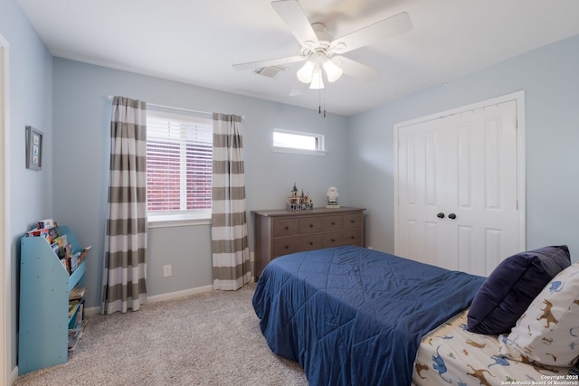 830 Emerald Bay, San Antonio, TX 78260 - bedroom featuring light carpet, a closet, ceiling fan, and baseboards