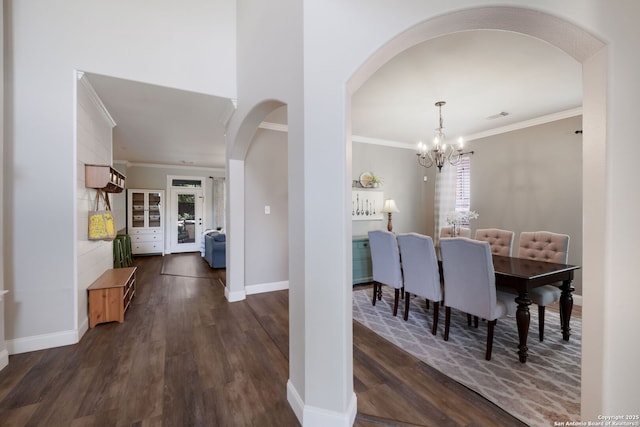 830 Emerald Bay, San Antonio, TX 78260 - dining space featuring arched walkways, healthy amount of natural light, a chandelier, ornamental molding, and dark wood finished floors
