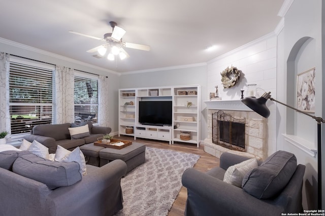 830 Emerald Bay, San Antonio, TX 78260 - living room featuring ornamental molding, ceiling fan, wood finished floors, and a fireplace