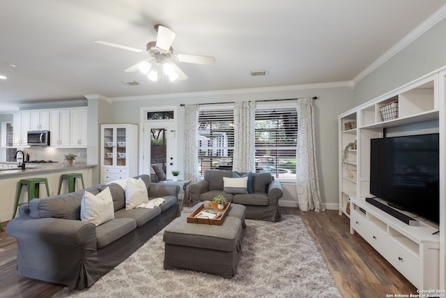 830 Emerald Bay, San Antonio, TX 78260 - living area with crown molding, dark wood-type flooring, a ceiling fan, and baseboards