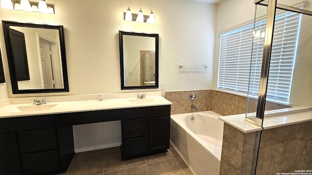 5930 Foster Bnd, San Antonio, TX 78244 - full bath with a bath, double vanity, a shower, and tile patterned flooring