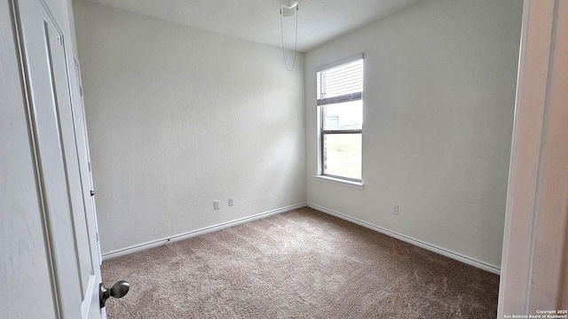 5930 Foster Bnd, San Antonio, TX 78244 - carpeted empty room with baseboards