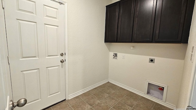 5930 Foster Bnd, San Antonio, TX 78244 - laundry area with electric dryer hookup, hookup for a washing machine, baseboards, and cabinet space