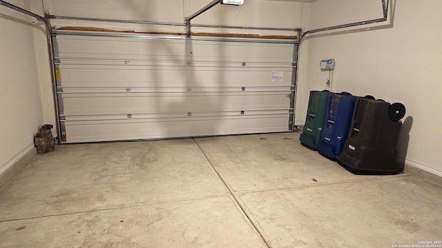 5930 Foster Bnd, San Antonio, TX 78244 - garage featuring baseboards