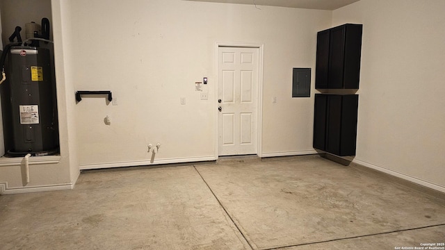 5930 Foster Bnd, San Antonio, TX 78244 - garage with electric water heater, electric panel, and baseboards