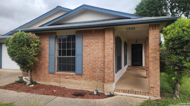 109 Deerglen, Universal City, TX 78148 - view of side of home with brick siding and board and batten siding
