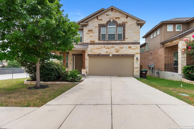 5509 Calaveras, San Antonio, TX 78253 - view of front of house with stone siding, a garage, concrete driveway, and a front lawn