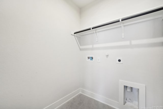 29527 Clanton Pass, San Antonio, TX 78260 - laundry area with electric dryer hookup, hookup for a gas dryer, washer hookup, baseboards, and tile patterned floors