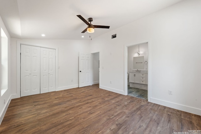 101 New York, San Antonio, TX 78214 - unfurnished bedroom featuring wood finished floors, lofted ceiling, recessed lighting, baseboards, and a closet