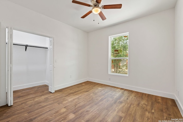 101 New York, San Antonio, TX 78214 - unfurnished bedroom featuring wood finished floors, baseboards, a closet, and ceiling fan