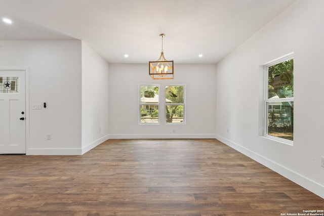 101 New York, San Antonio, TX 78214 - unfurnished room with recessed lighting, a chandelier, wood finished floors, and baseboards